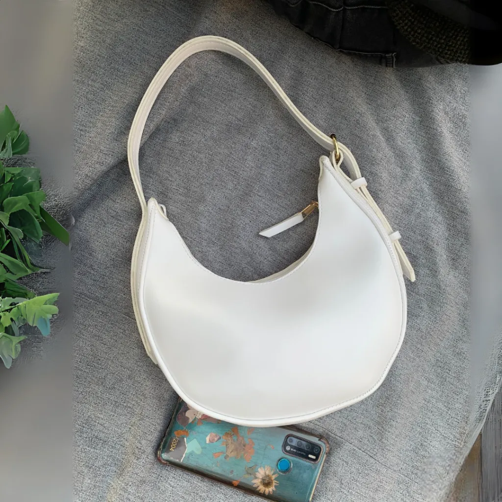 reena-ali-stylish-handbags-pakistan, reenaali-tote-bags-online-pakistan, premium-leather-handbags-reena-ali, trendy-crossbody-bags-reenaali-com, new-arrival-ladies-bags-pakistan, reenaali.com (4).webp